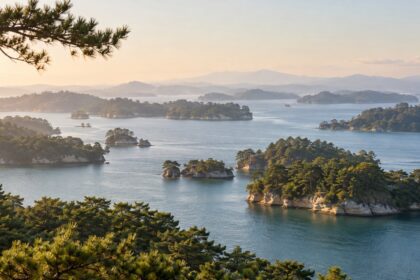 AI-generated illustration of pine-covered islands in calm blue water, inspired by Matsushima Bay, Miyagi.