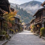 AI-generated illustration of a quiet street lined with wooden merchant houses and distant mountains, inspired by Narai-juku in Nagano, Japan.