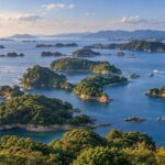 AI-generated illustration of forested islands across a blue inlet in late-afternoon light, inspired by Kujukushima in Nagasaki.