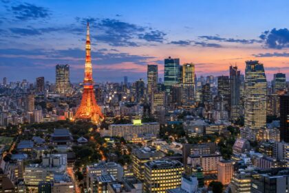 AI-generated illustration of Tokyo Tower and a city skyline at blue hour